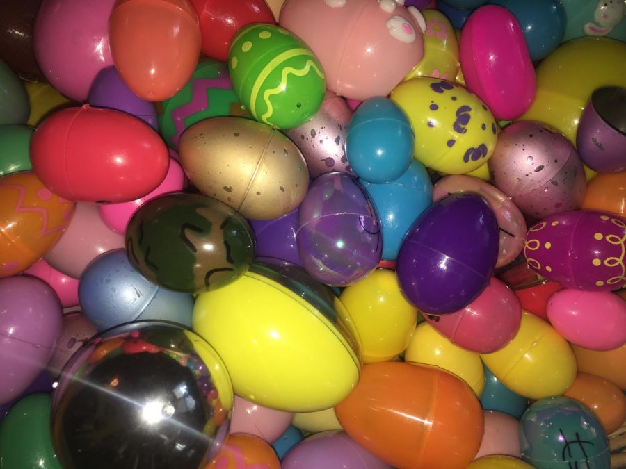 A pile of multicolored plastic Easter eggs.