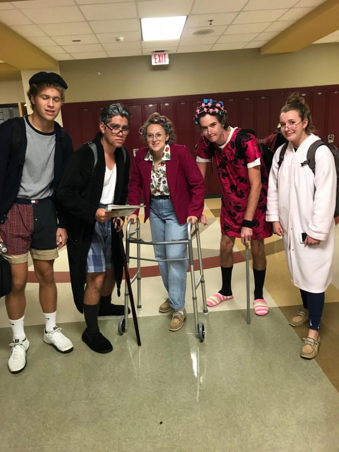 Five people dressed as old people for spirit day