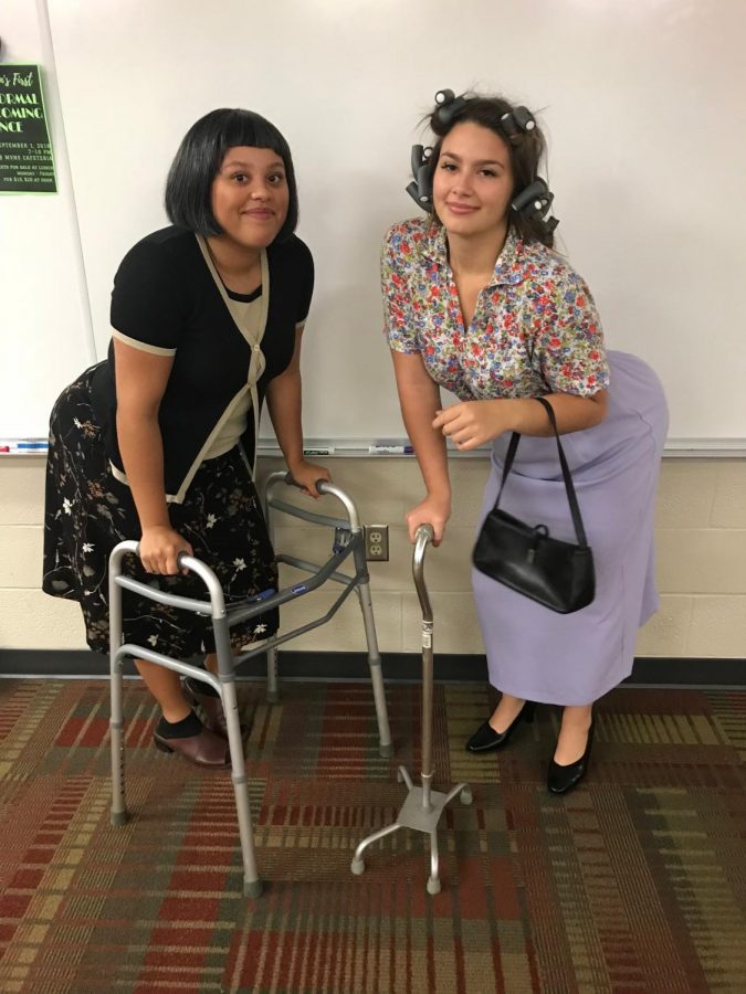 Two students dressed as old ladies
