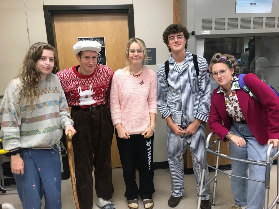 Five people dressed as old people for spirit day