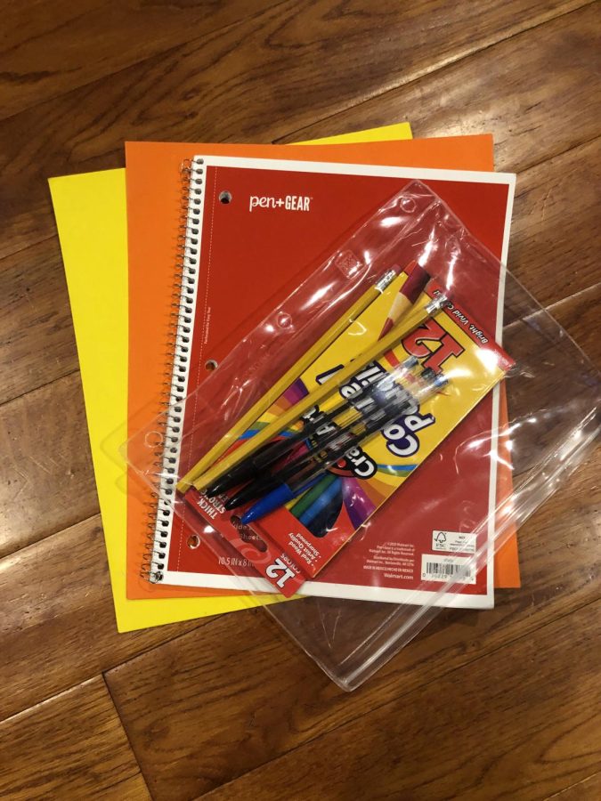 notebooks, colored pencils and pencils (school supplies)