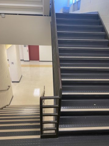 11 (bottom) and 12 (top) staircase with a total of 23 steps at the end of the English hallway (top floor) and next to Mrs. Riesterers classroom (bottom floor).