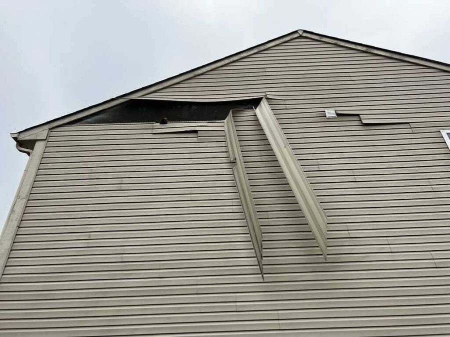 There was a terrible windstorm on the 8th of February. Area houses lost siding, roofing, and other exterior materials. 
