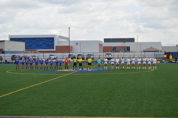 Girls´ varsity starters lineup for the National Anthem. 