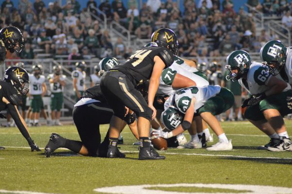 Mt. Vernon’s defense lines up against the Pendleton Heights offense. 
