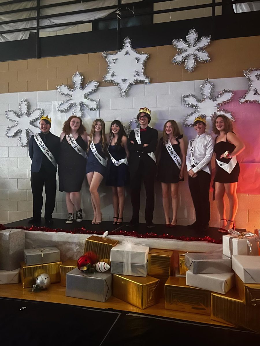 Snow Whirl’s court stands on the decorative stage. 
From left to right: 
Daniel Barnes
Stephanie Wiederkehr
	Emma Carver
	Katherine Bowsher
	Owen Tricker 
	Camden Fein
	Tyler Black
	Natalie Sparks

