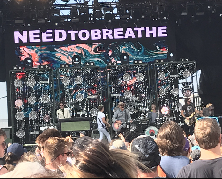 The band NEED TO BREATHE performing onstage at the Forecastle Music Festival.