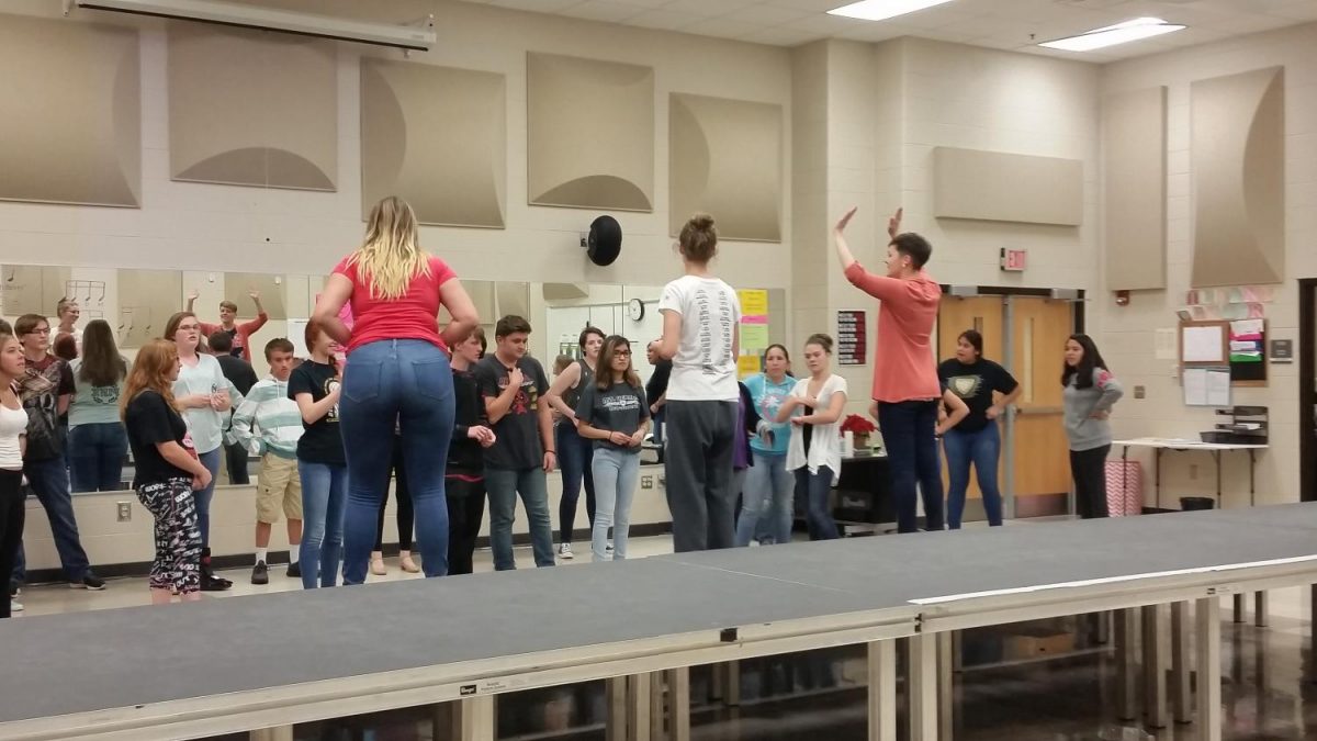 Students being taught swing dancing