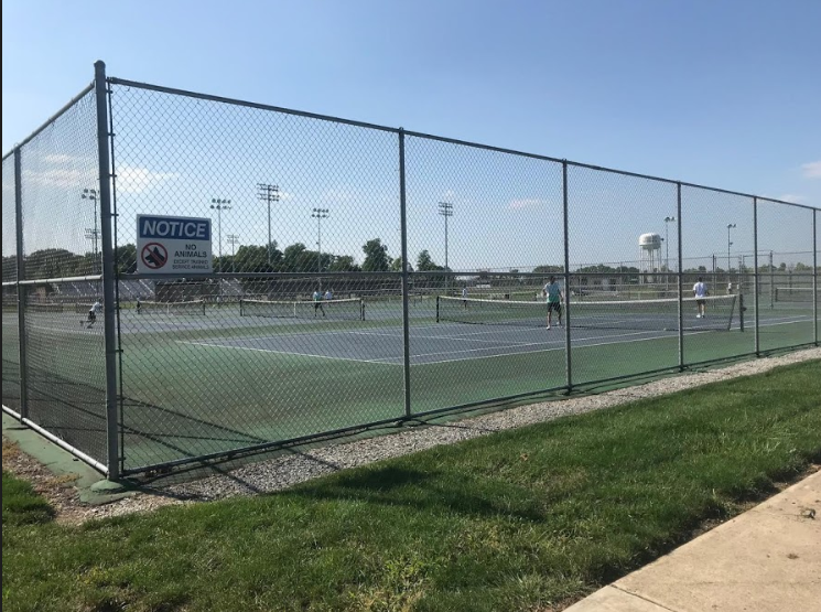 The tennis team practices after school.