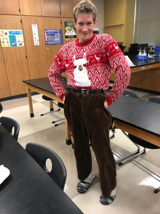 A student dressed in a llama sweater for Spirit Day