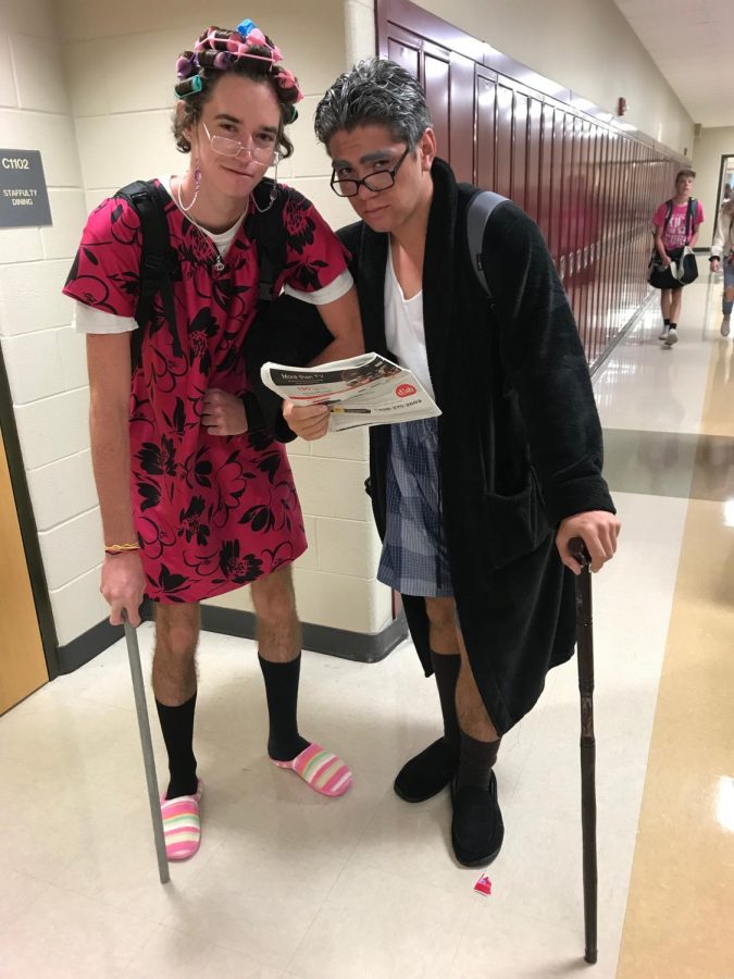 Two people posing for Spirit Week