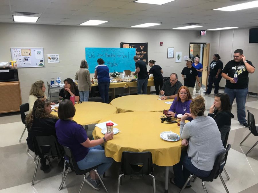 Teachers enjoy the breakfast foods provided by student government on Friday 9/21