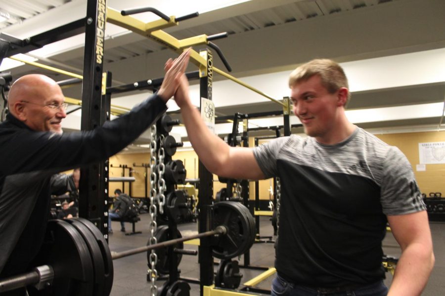 Coach Kirshner highfives Connor Price