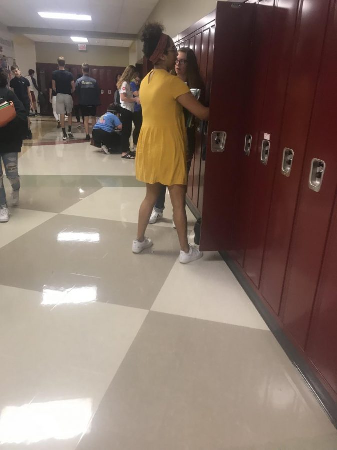 students using lockers