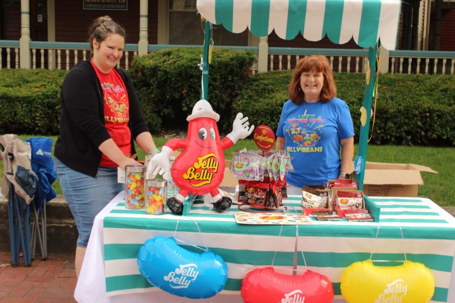 Business owners from Cynthia's Hallmark shop in their decorated booth for the Greenfield Chocolate Walk