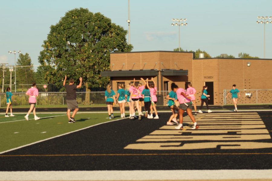 Seniors cheer as they score a point. 
