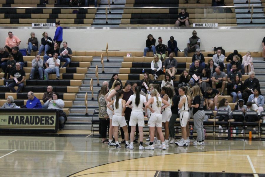 The 1st quarter ended and the team was discussing the plays for quarter 2. 
