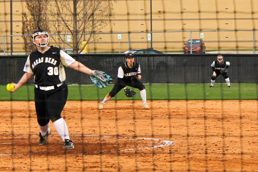  Number 30, Sophie Ruschhaupt (9), pitching. 
