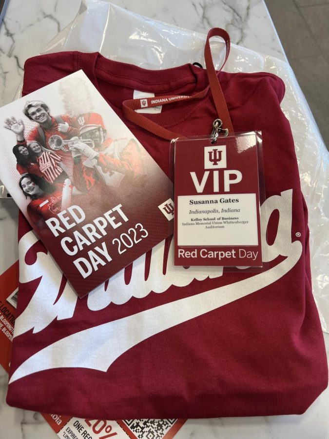 The information booklet, lanyard, and free T-shirt given to students attending Red Carpet Day.
