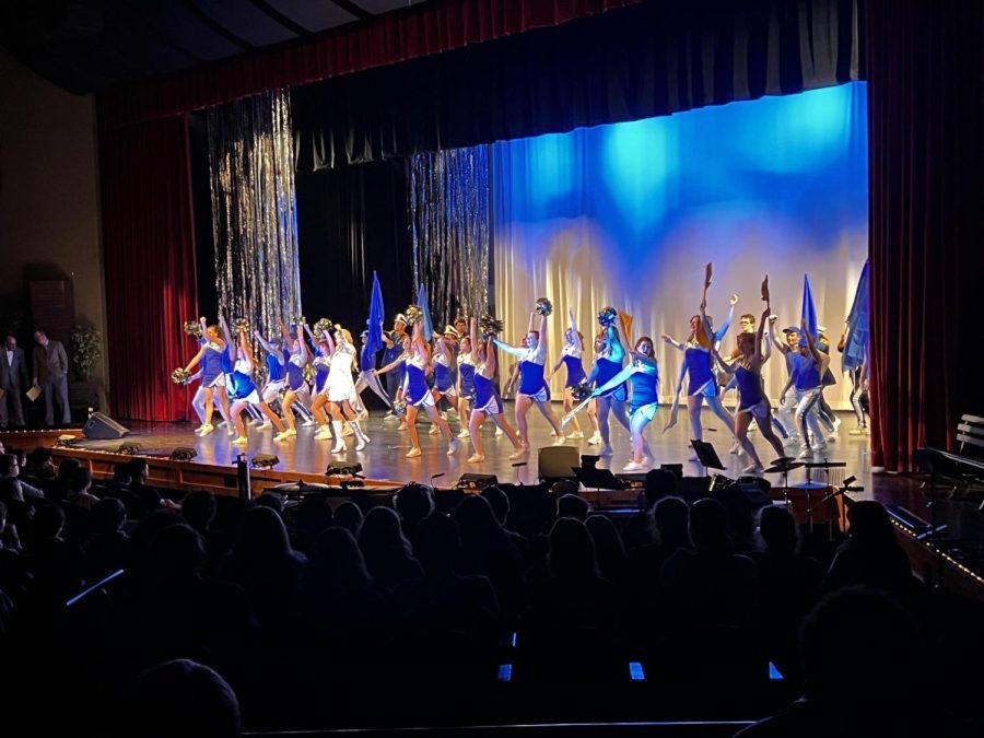  The whole cast cheer during the dance number, "What You Want."
