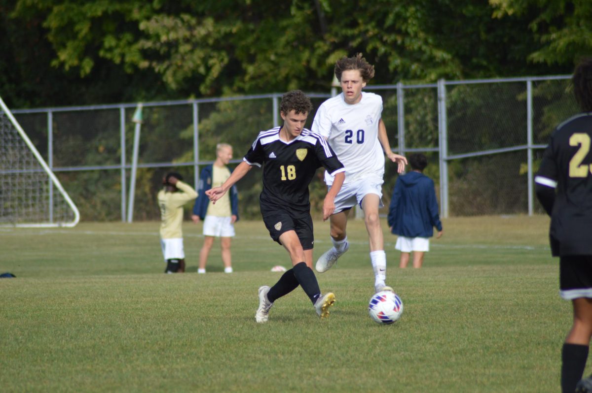 Number 18, Noah Scott, attacking the opposing goal. 