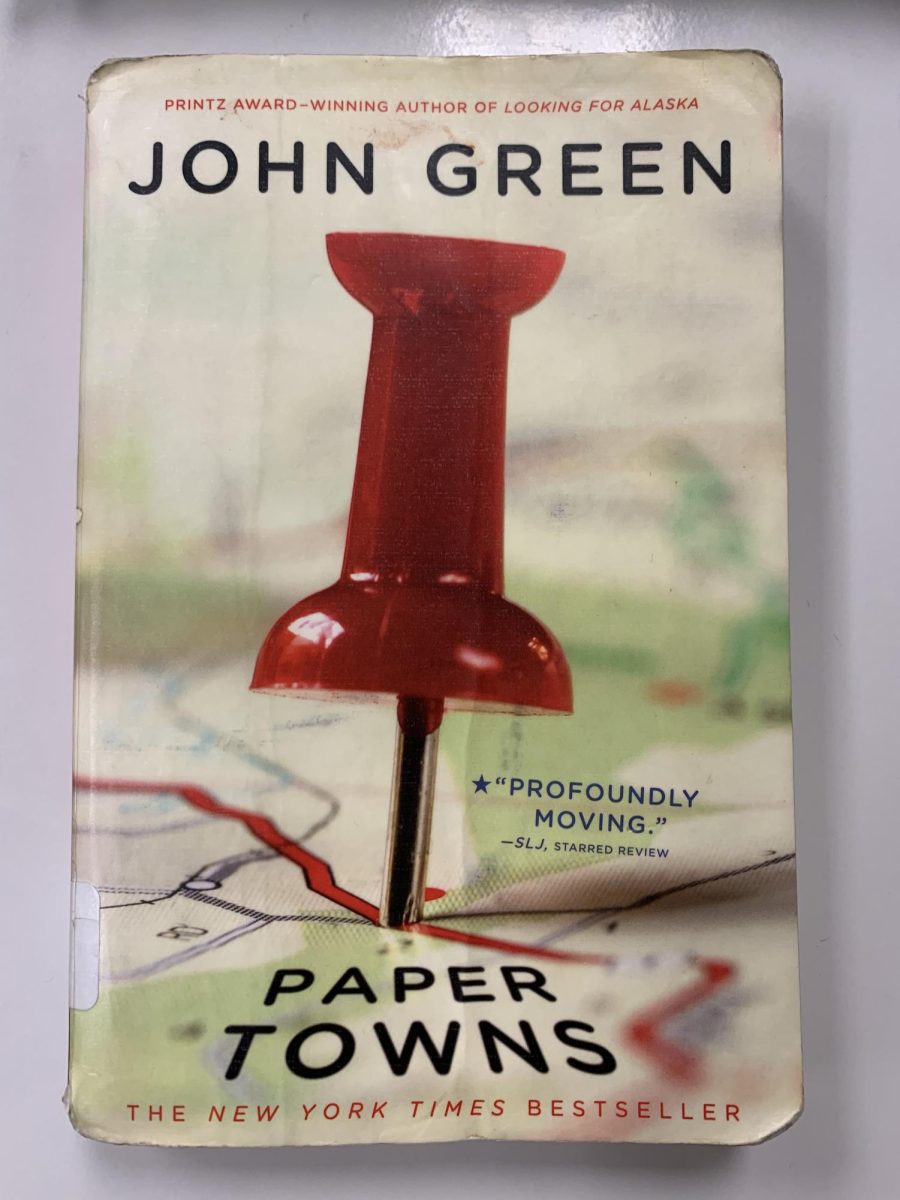 “Paper Towns” is a book by John Green. It is a mystery novel about a kid who tries to find the girl of his dreams after she goes missing. 
