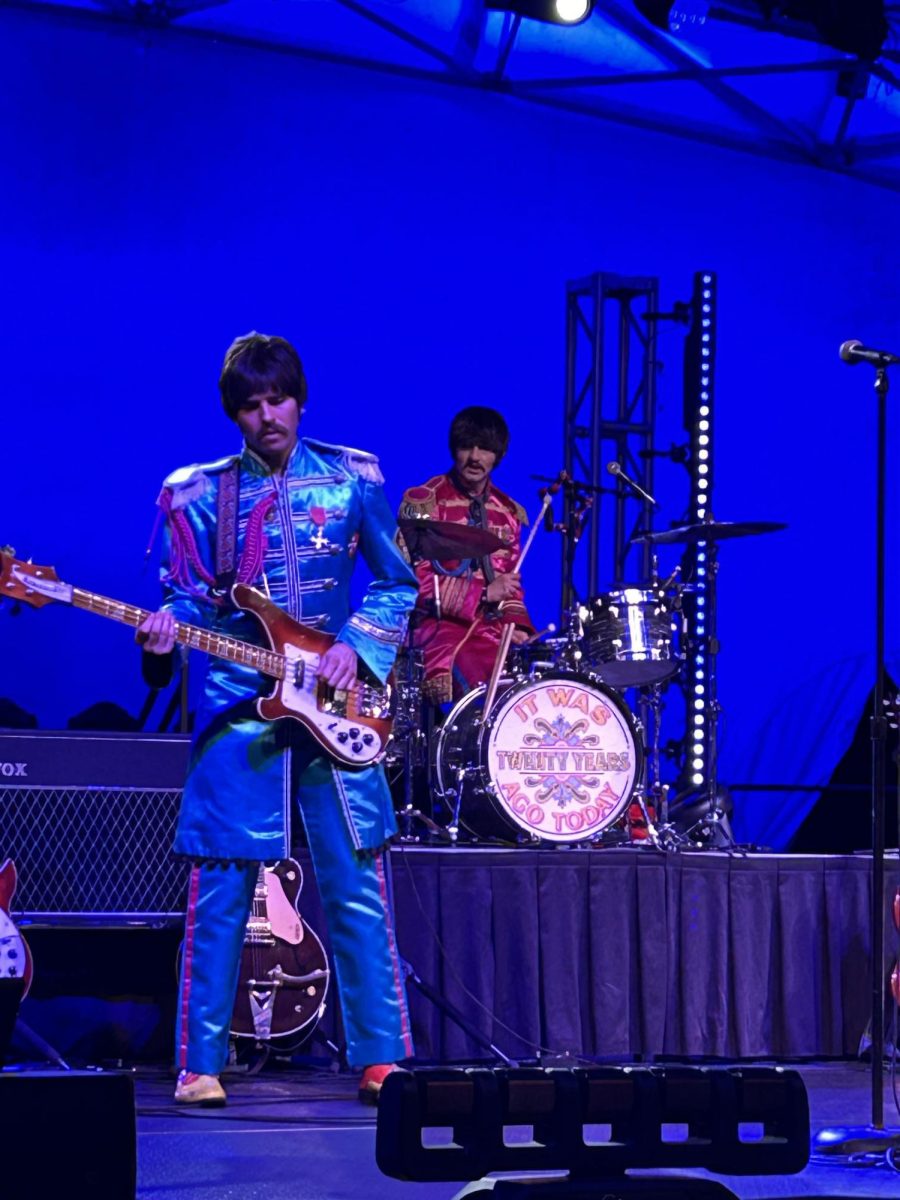 Paul and Ringo, portrayed by impersonators, of the Fab Four, a Beatles tribute band.