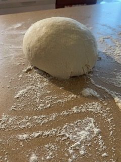 The dough consists of water, flour, yeast and sugar. While the ingredients are simple, the process can take time. 
