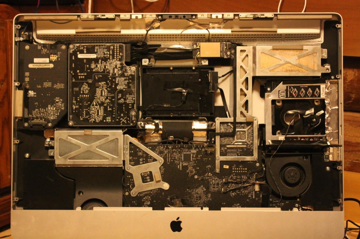  The internals of a 2009 iMac. Both the original hard drive and the optical disk have been replaced.